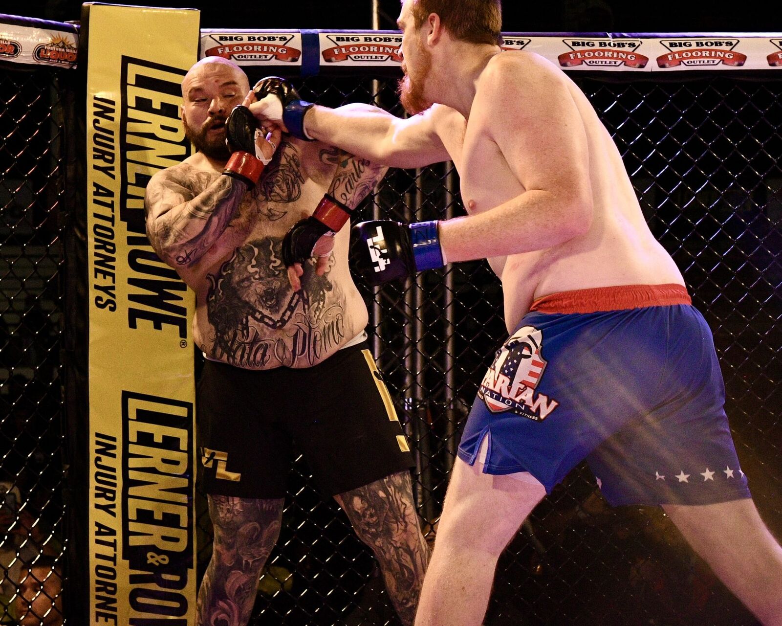 YFL heavyweight bout with Lerner and Rowe banner in background